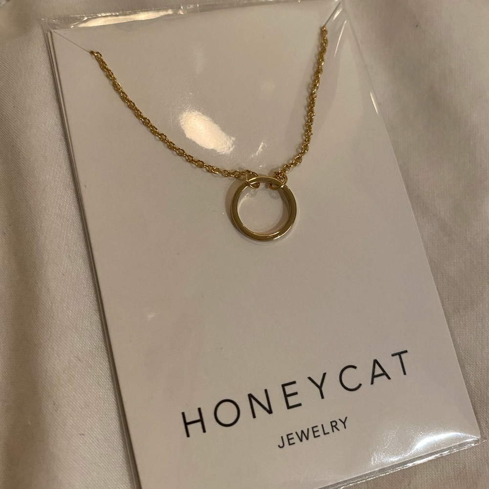 karma gold plated necklace ring